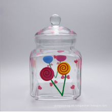 Jarra de dulces de vidrio con tapa y caja de color
